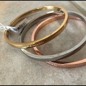 Coach - authentic set of three “tri-tone” bangles